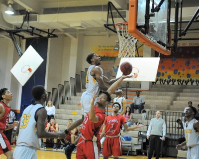 Johnny Hughes drives to the basketball during a FTCC basketball game