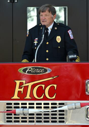 Fire Chief Freddy Johnson speaks at the podium.